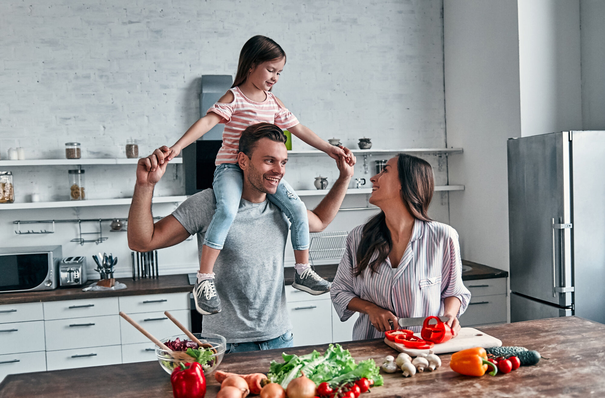 Family members having time together in kitchen